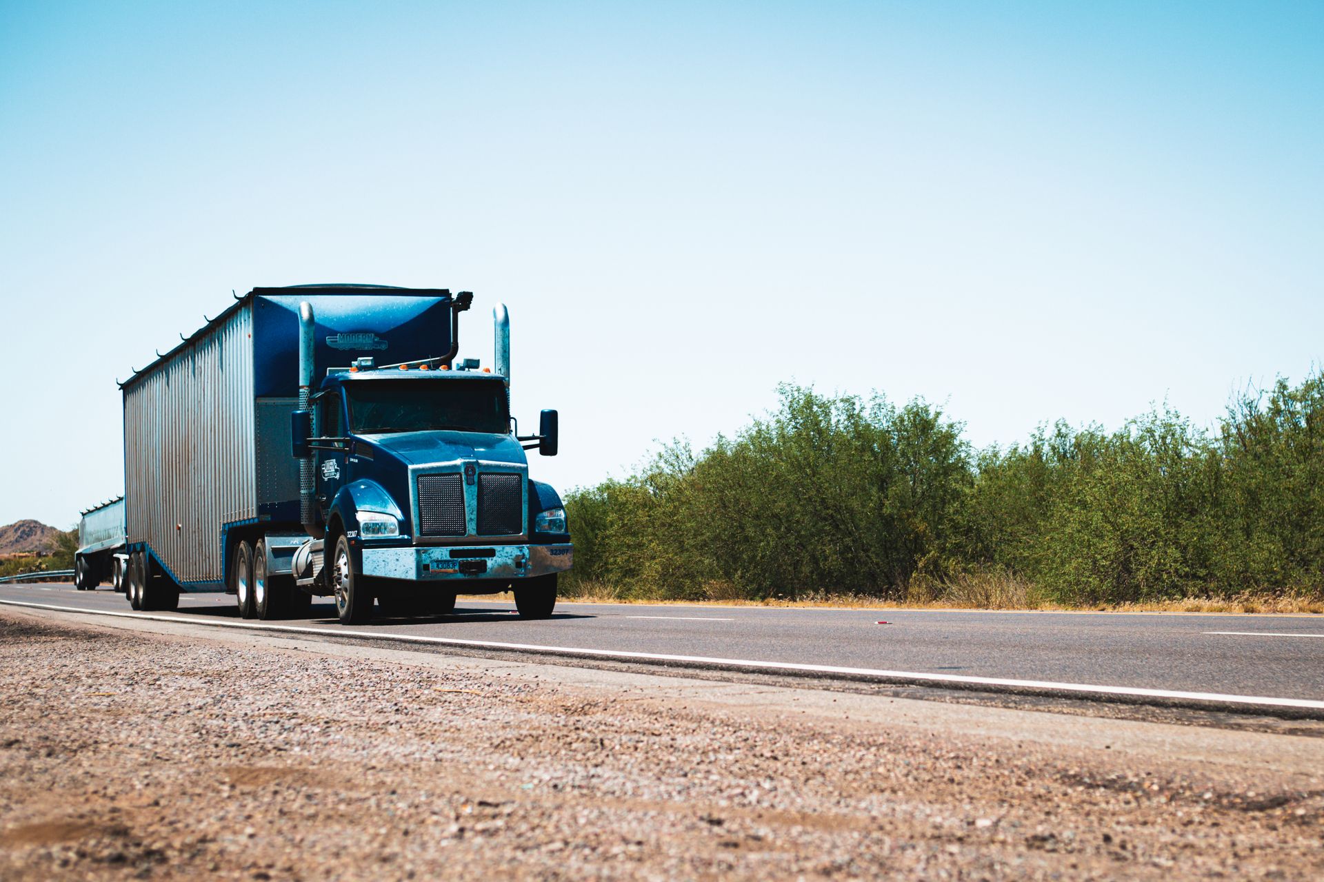 Truck on the highway under open sky